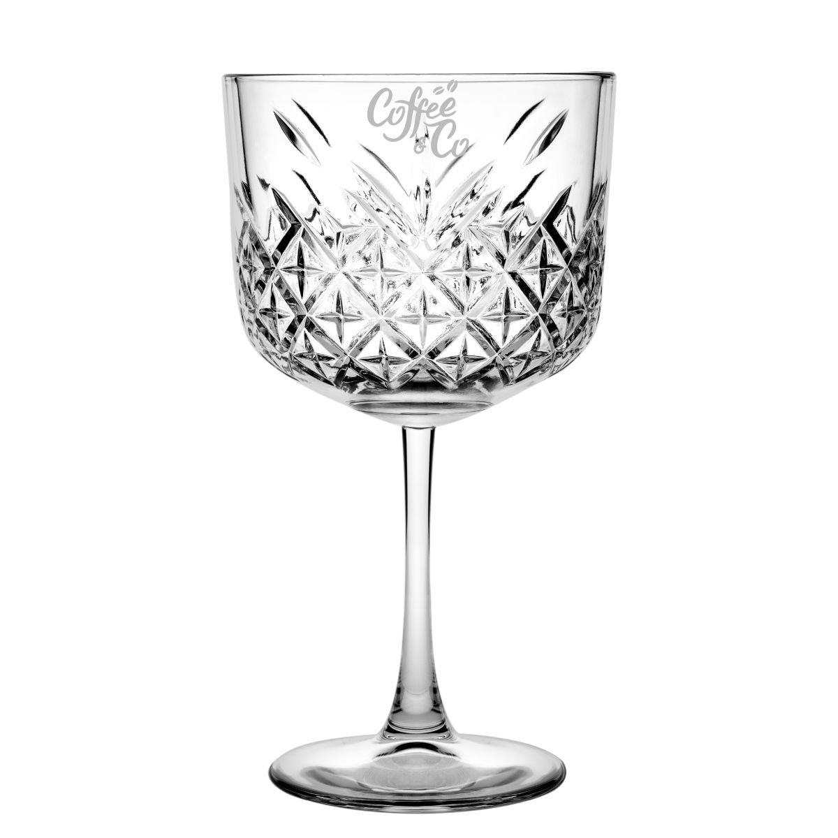 Voorzijde van gin-tonic glas met gegraveerd CoffeeCo-logo, subtiel in helder glas.